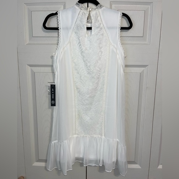 Sleeveless White Dress - Picture 2 of 3